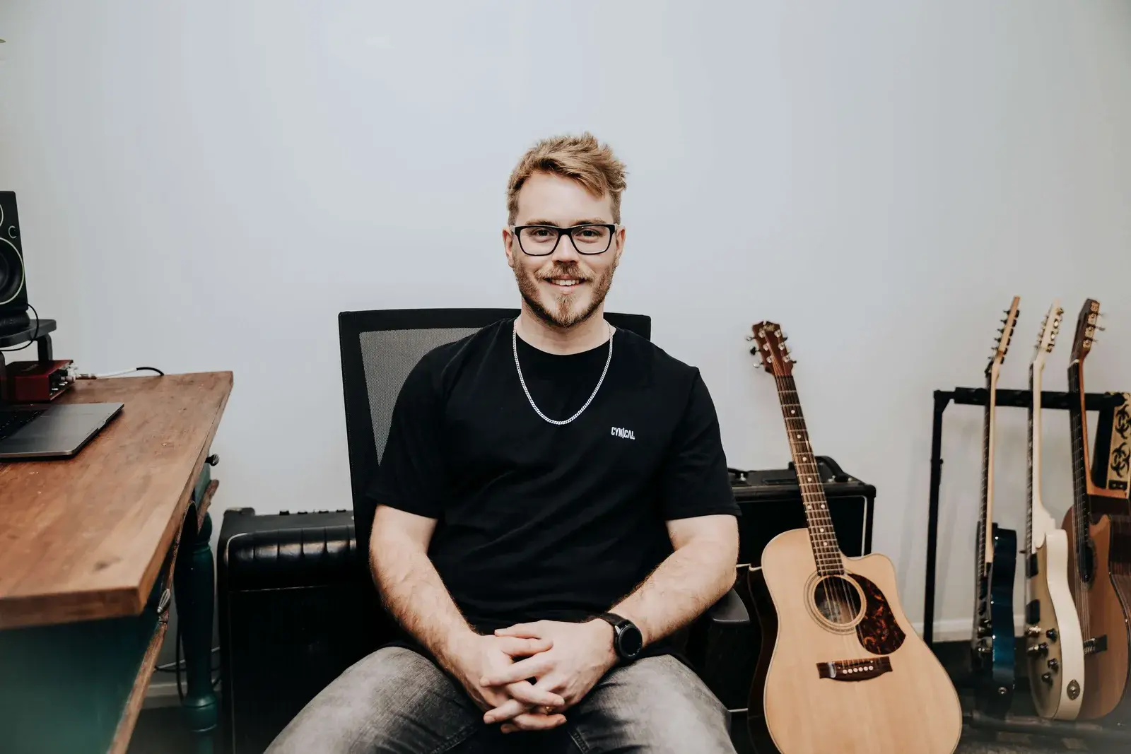 Damien Hill, experienced guitar teacher at Six Strings Townsville, in the teaching studio